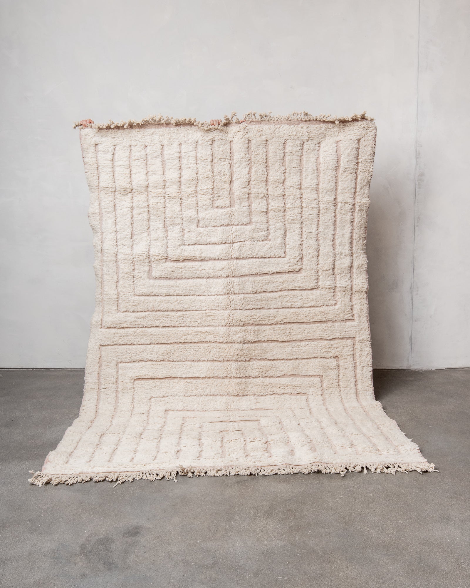 Modern, designer, handcrafted Berber rug from Morocco. Beniourain carpet with beautiful colours and patterns and fluffy wool texture.